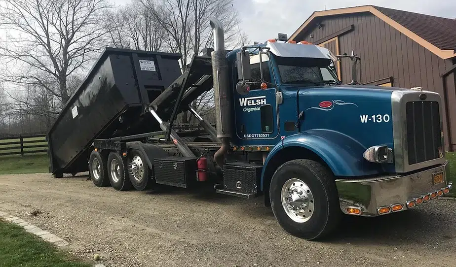 Farm waste removal container. Truck used for manure removal.